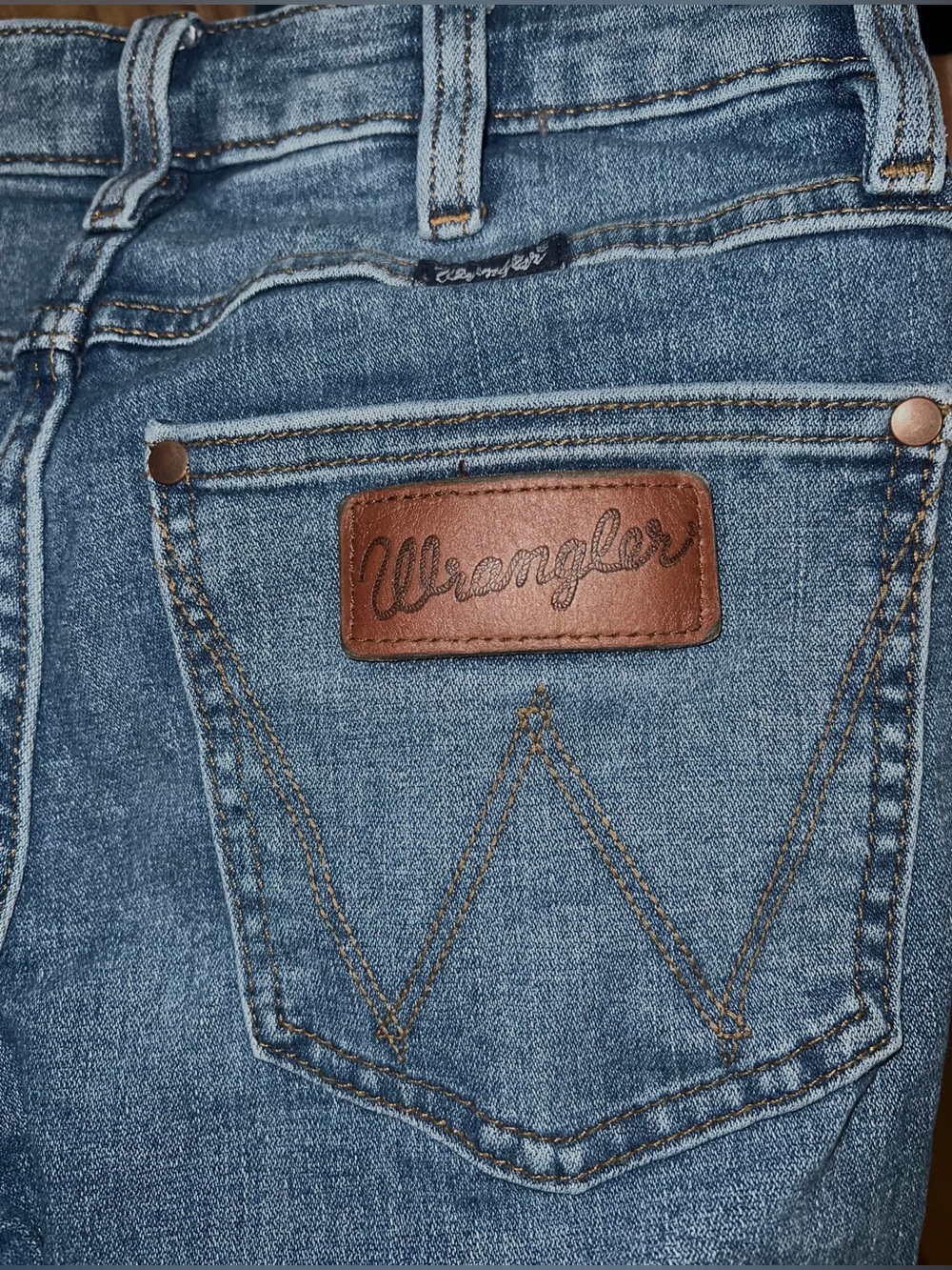 Women’s Wrangler Retro Blue Denim Jeans with Brown Button